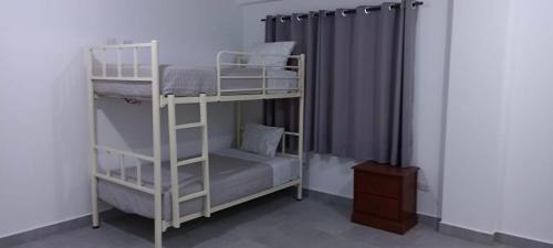 Postel nebo postele na pokoji v ubytování Casa de Campo en Cieneguilla