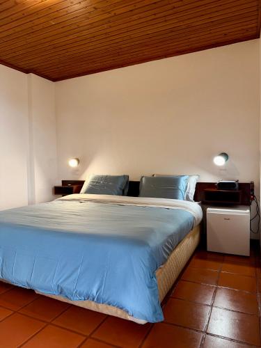 Habitación con estacionamiento y baño privado