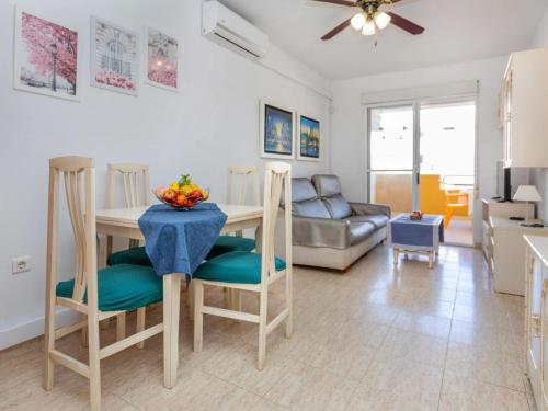 a kitchen and living room with a table and chairs at Apartment Portofino IV by Interhome in Oropesa del Mar