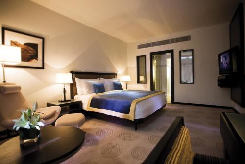 Krevet ili kreveti u jedinici u objektu Avani Deira Dubai Hotel