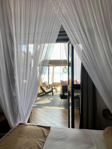 Katil atau katil-katil dalam bilik di Hotel Budamar Zipolite