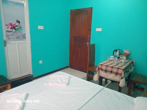 Ένα ή περισσότερα κρεβάτια σε δωμάτιο στο Jaans Inn