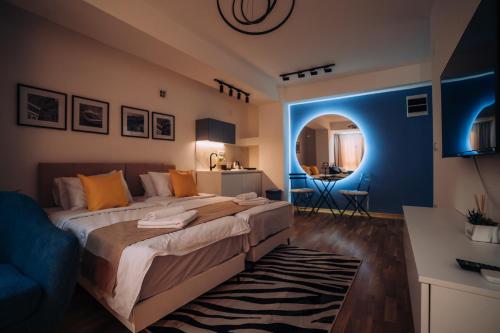 Ένα ή περισσότερα κρεβάτια σε δωμάτιο στο Vil Apartments