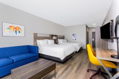Ένα ή περισσότερα κρεβάτια σε δωμάτιο στο Holiday Inn Express & Suites Macclenny by IHG