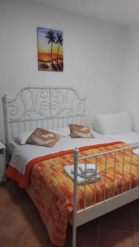 Ένα ή περισσότερα κρεβάτια σε δωμάτιο στο B&B Zurro Room e breakfast