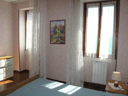 Ένα ή περισσότερα κρεβάτια σε δωμάτιο στο Holiday Home Agnese - DOL235 by Interhome