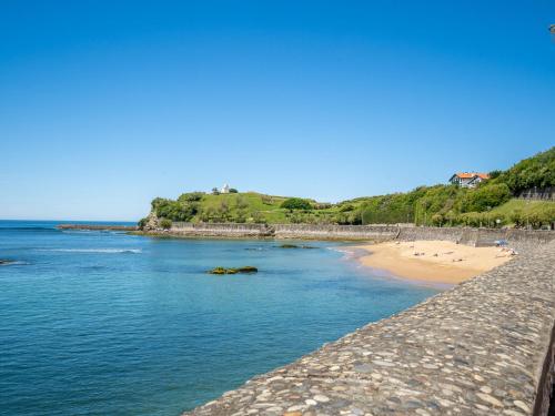 a view of a beach and the ocean at Apartment Bikaleak by Interhome in Ciboure