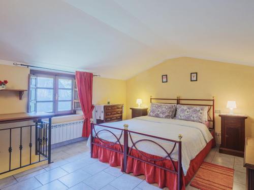 Katil atau katil-katil dalam bilik di Holiday Home L'Oliveto by Interhome