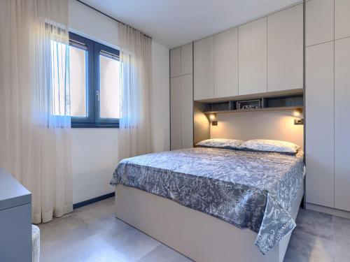 Postel nebo postele na pokoji v ubytování Holiday Home Kuća Marko by Interhome