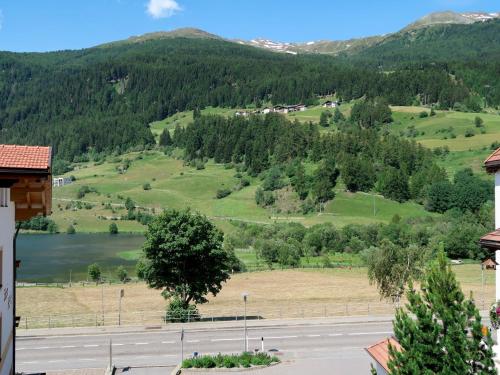 a view of a valley with a road and mountains at Holiday Home Haupthaus Schönblick - SVH123 by Interhome in San Valentino alla Muta