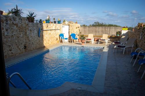 Der Swimmingpool an oder in der Nähe von Il figolla farmhouse