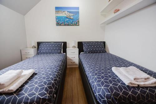 Ένα ή περισσότερα κρεβάτια σε δωμάτιο στο Willa , Cosy house in Inverness