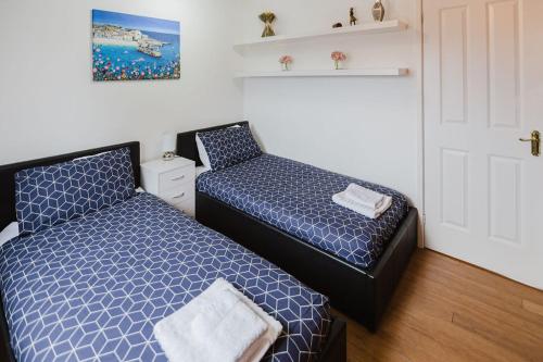 Ένα ή περισσότερα κρεβάτια σε δωμάτιο στο Willa , Cosy house in Inverness