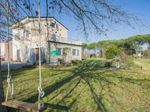 an old house in the middle of a yard at Apartment Lavanda by Interhome in Spianate