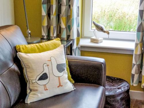 Ruang duduk di Holiday Home Cuan Beag by Interhome