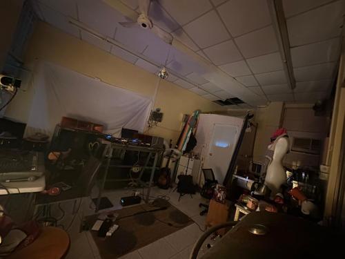 a living room with a room with a room at HappyHealingHeaven in Hengchun
