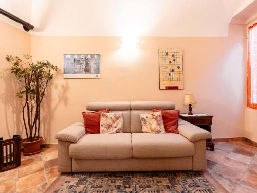 a living room with a couch in a room at Holiday Home S-Caterina by Interhome in Cervo