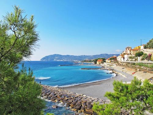 a view of a beach with the ocean and buildings at Holiday Home S-Caterina by Interhome in Cervo