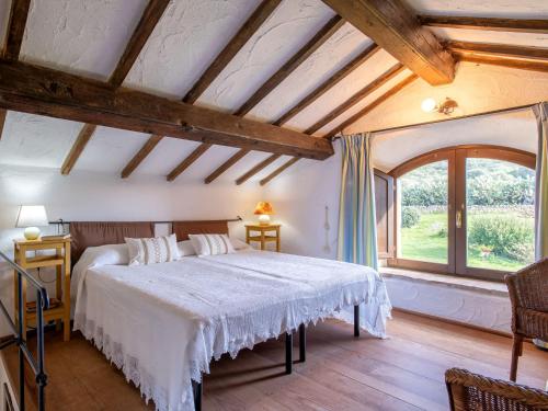 Postel nebo postele na pokoji v ubytování Holiday Home Libeccio by Interhome