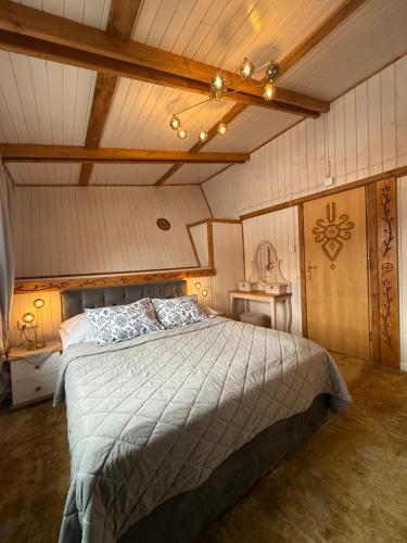 ECO Willa Karpatia Ski&Wellnessにあるベッド