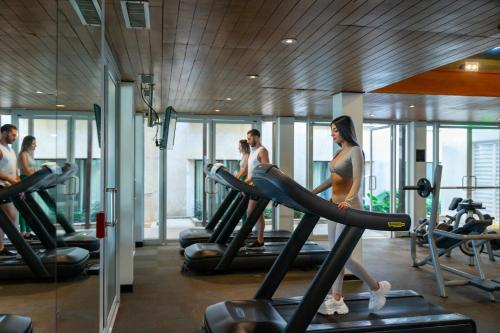 a group of people in a gym on treadles at Intercontinental Real Guatemala by IHG in Guatemala