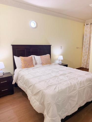 Ένα ή περισσότερα κρεβάτια σε δωμάτιο στο Mi casa Amalia