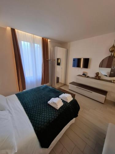 Postel nebo postele na pokoji v ubytování Suite House 5 Terre