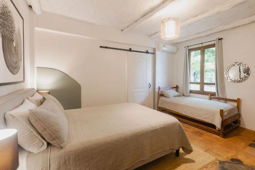 Letto o letti in una camera di Venao Surf Lodge