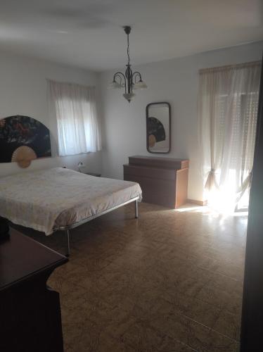 Ένα ή περισσότερα κρεβάτια σε δωμάτιο στο CASA BALBI ACQUAVENA