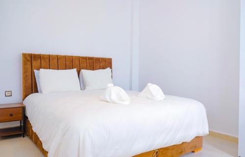 Ein Bett oder Betten in einem Zimmer der Unterkunft Dakhla oasis