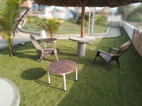 Jardin de l'établissement Oceanfront apartment in Tucacas, Morrocoy