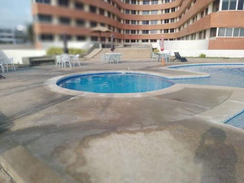 Piscine de l'établissement Oceanfront apartment in Tucacas, Morrocoy ou située à proximité