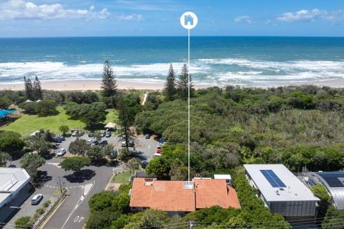 an aerial view of a parking lot and the beach at Parkside on Plover Street in Peregian Beach