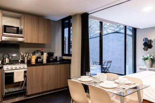 Η κουζίνα ή μικρή κουζίνα στο Espectacular Loft Con terraza en Condesa