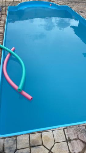 Kolam renang di atau dekat dengan Casa - Área de Laser com Piscina em Rifaina