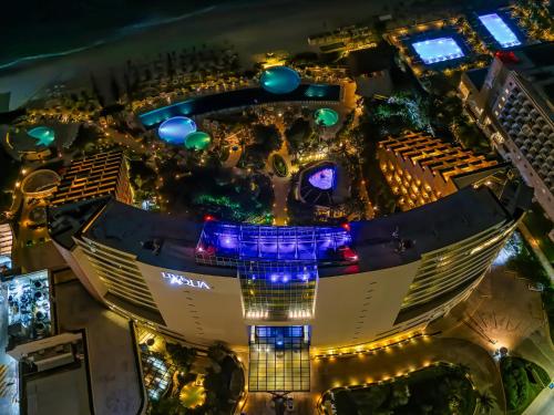 an aerial view of a building at night at Live Aqua Cancun - Adults Only - All-Inclusive in Cancún