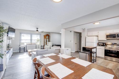 a kitchen and living room with a table in a room at 3 Mi to Cuyahoga Valley NP Fairlawn Family Home! in Fairlawn
