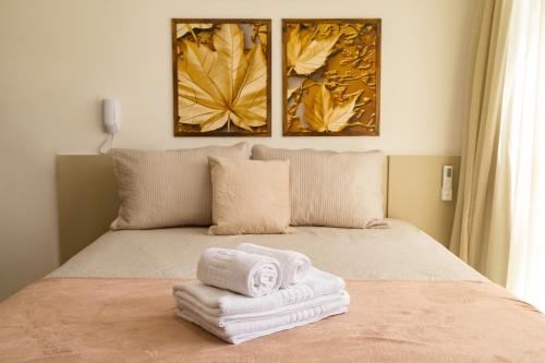 Cama ou camas em um quarto em Flat a 2 min da praia em João Pessoa