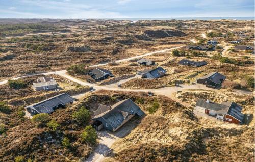 an aerial view of a home in a field at Pet Friendly Home In Henne With Sauna in Henne Strand