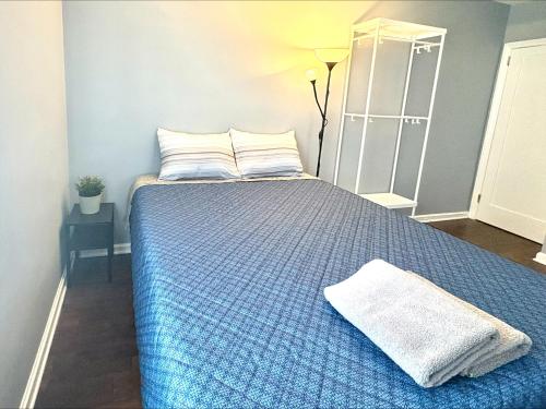 Postel nebo postele na pokoji v ubytování Cozy Apartments close to New York City