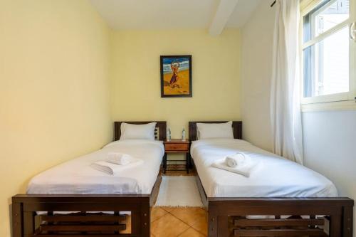 Ένα ή περισσότερα κρεβάτια σε δωμάτιο στο Appartement Cosy Proche du Stade