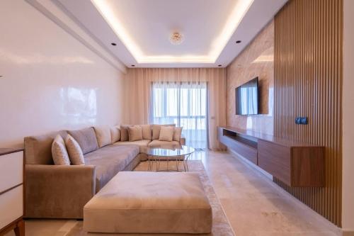 TV a/nebo společenská místnost v ubytování Appartement Prestige et Confort