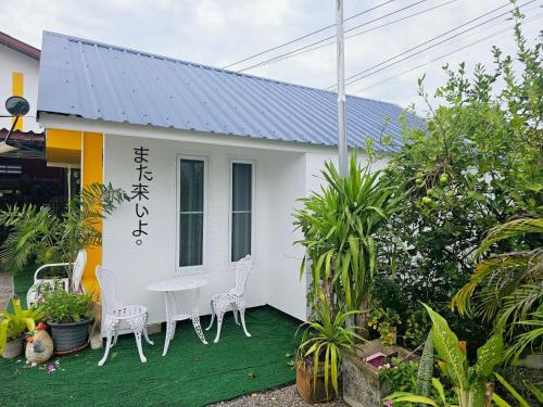 Un jardín fuera de ชมทุ่ง โฮมสเตย์