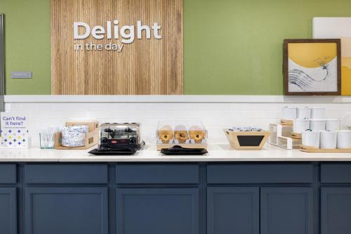 a counter in a store with products on it at Spark by Hilton Rock Springs in Rock Springs