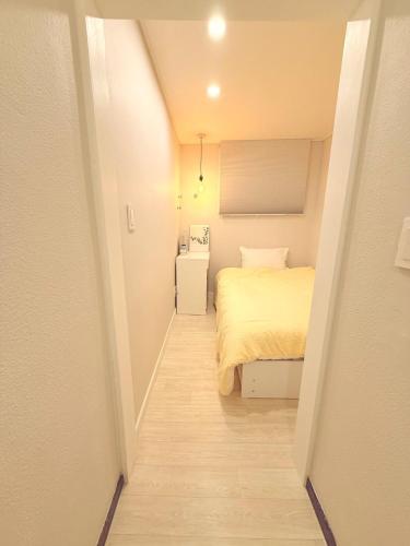 Letto o letti in una camera di GreeneStay Sindang DDP Seoul