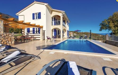 an image of a villa with a swimming pool at Gorgeous sea-view VillaSol with pool & BBQ in Zagorje