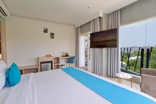 Zasgo Hotelにあるテレビまたはエンターテインメントセンター