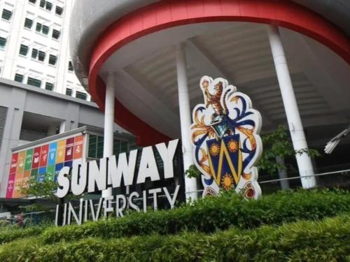 a sign in front of a building with the sunway inntiliety at Edumetro 3 bedroom Subang Sunway By MICASA GROUP in Subang Jaya