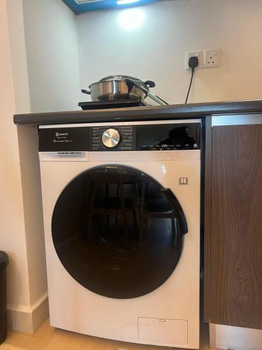a microwave with a pot on top of it at Edumetro 3 bedroom Subang Sunway By MICASA GROUP in Subang Jaya