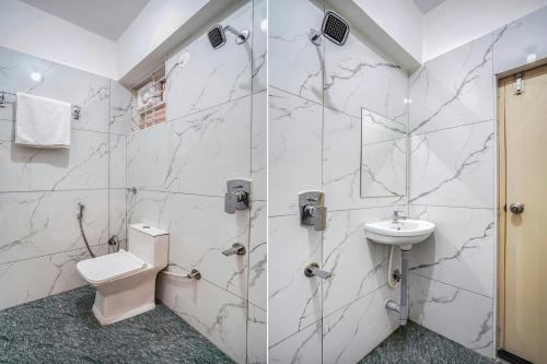 Bilik mandi di FabHotel Redmoon Suites - Nr Brookfield